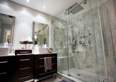 Elegant master ensuite bathroom with a modern design, showcasing the exceptional craftsmanship of a general contractor in Ottawa